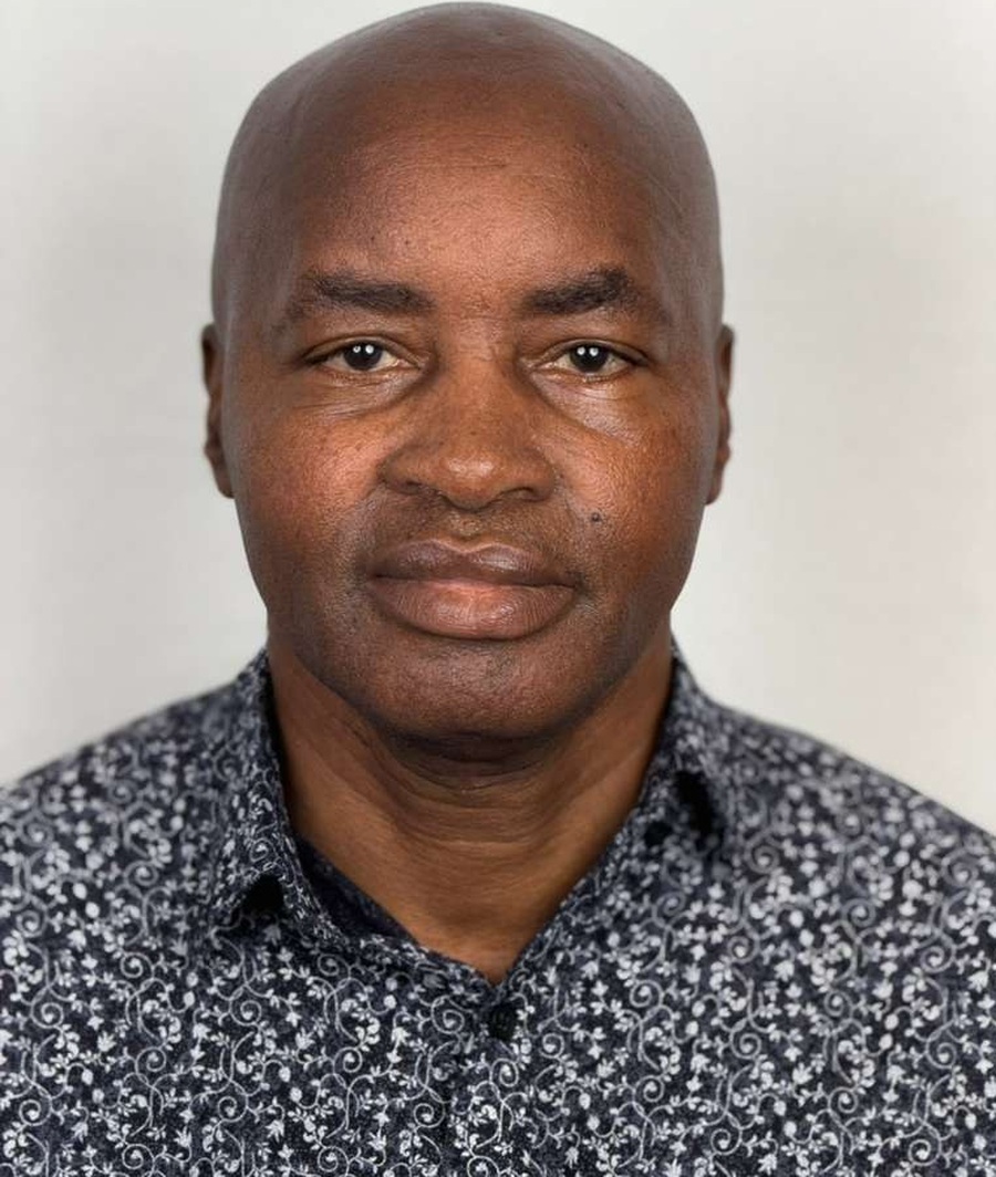 Portrait of Mr. Robert Bett, Consul Immigration
